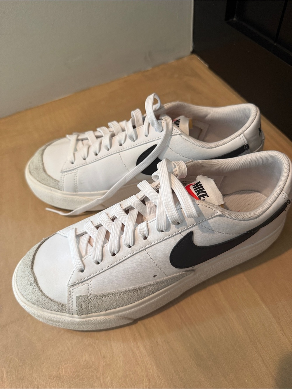 Nike Women’s White Sneakers with Black Swoosh